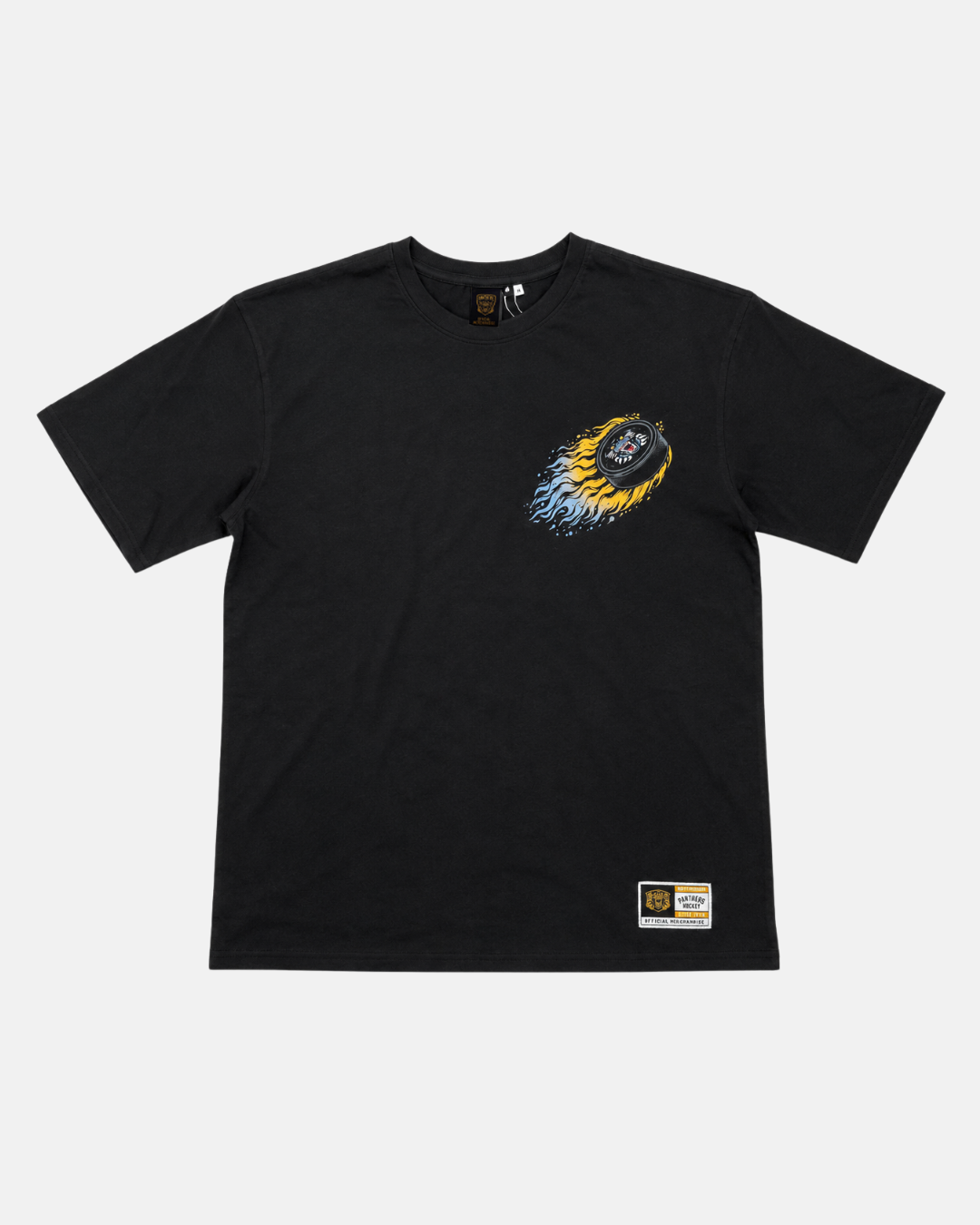 The Panthersland 26-27 Puck T-Shirt is a black, short-sleeve tee made from premium fabric, featuring a small puck-with-flames graphic on the left chest and a rectangular text patch near the bottom hem on the front.