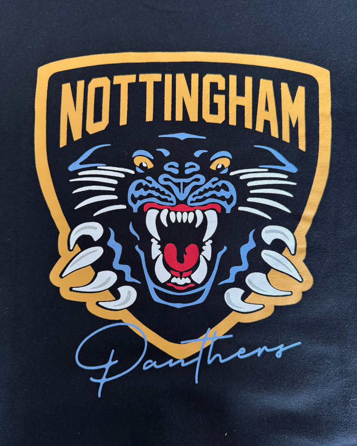 Show your team spirit with the 26-27 NP Signature Hoodie from Panthersland, featuring a yellow and blue shield crest logo with NOTTINGHAM at the top, a roaring panther in the center, and “Panthers” in cursive at the bottom—available on a classic black hoodie.