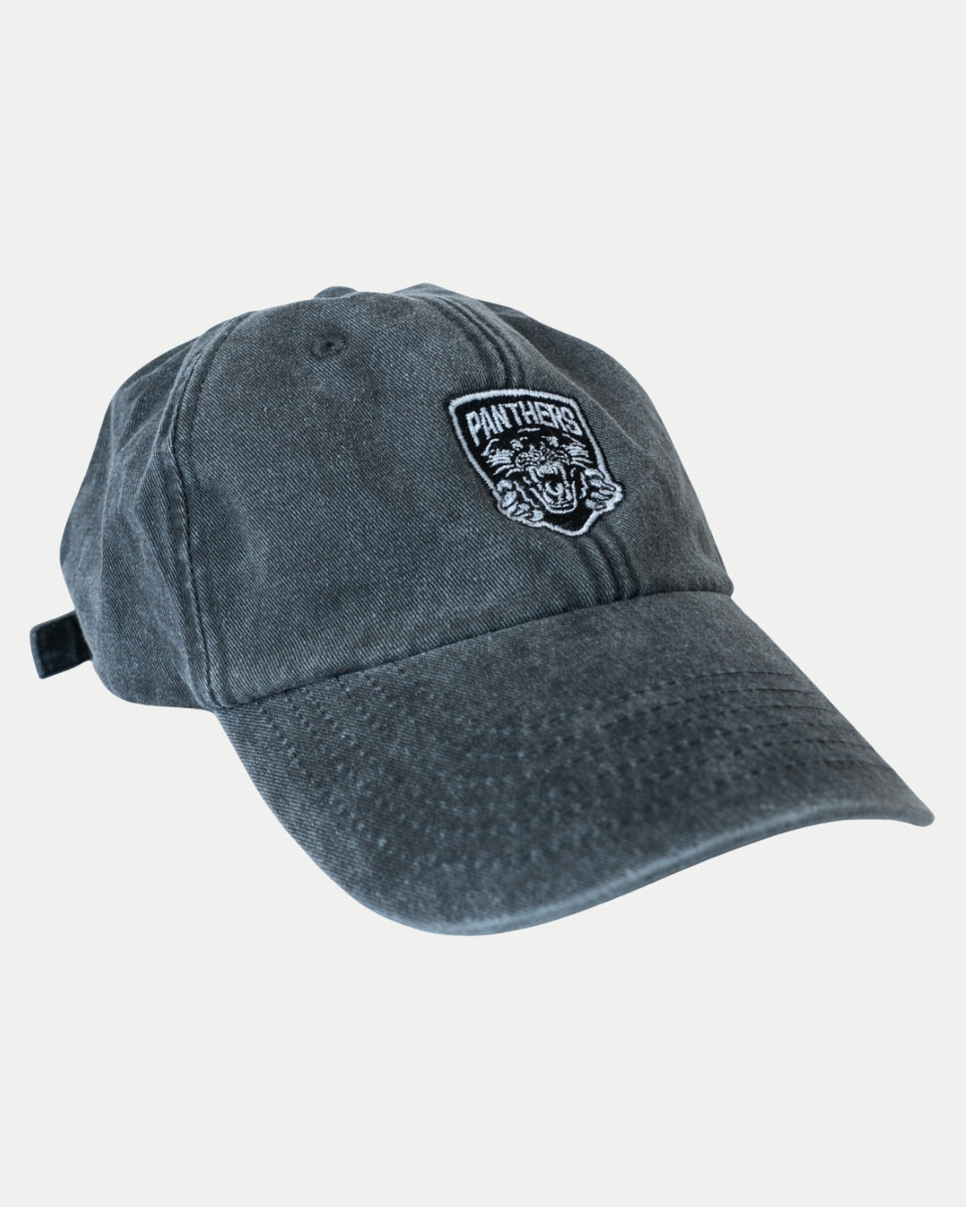 The Nottingham Panthers Made To Order Vintage Cotton Panthers Dad Hat in vintage black features a curved brim, fierce tiger patch with PANTHERS on front, brushed washed cotton construction, and an adjustable strap at the back.