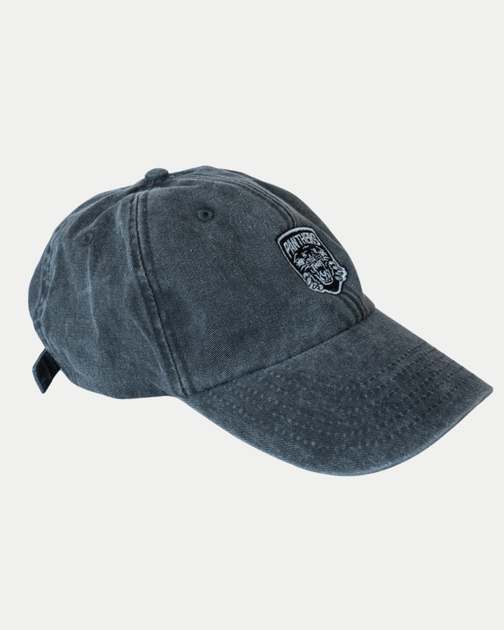 The Nottingham Panthers Made To Order Vintage Cotton Dad Hat in Vintage Black features a curved brim and an embroidered panther head patch with “PANTHERS,” offering a classic, laid-back look.
