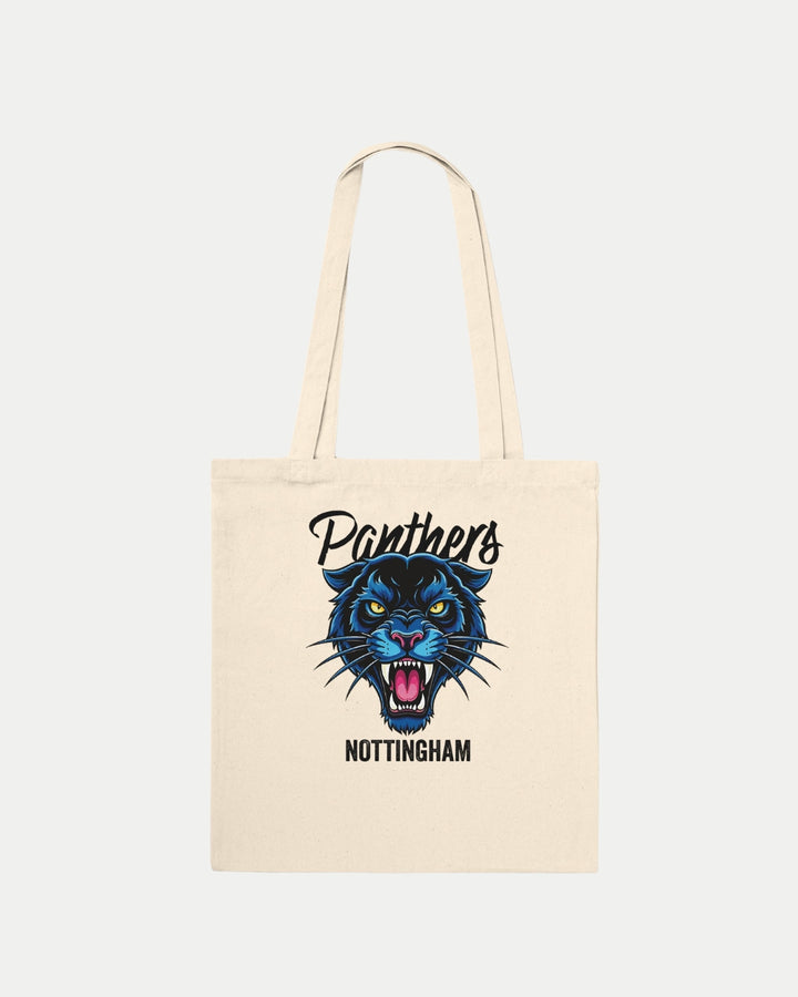 The Made To Order Panthers Graphic Tote Bag Natural by Nottingham Panthers is a cream cotton tote featuring a bold blue and black panther head graphic, Panthers above, and Nottingham below—perfect for eco-conscious fans.