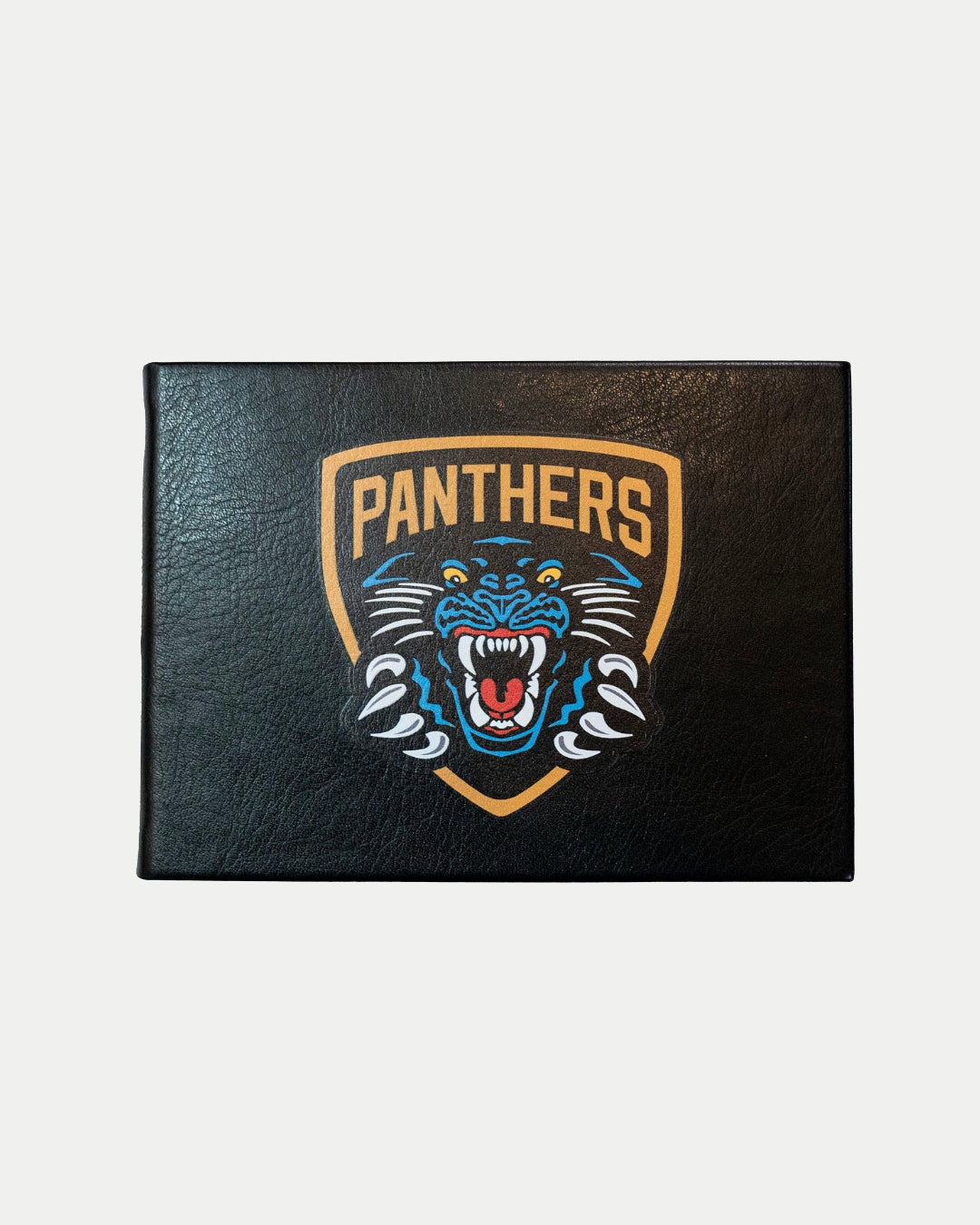 A stylish autograph book by Panthersland, featuring the Nottingham Panthers logo—a bold blue and black panther crest with PANTHERS in striking yellow letters on the cover.